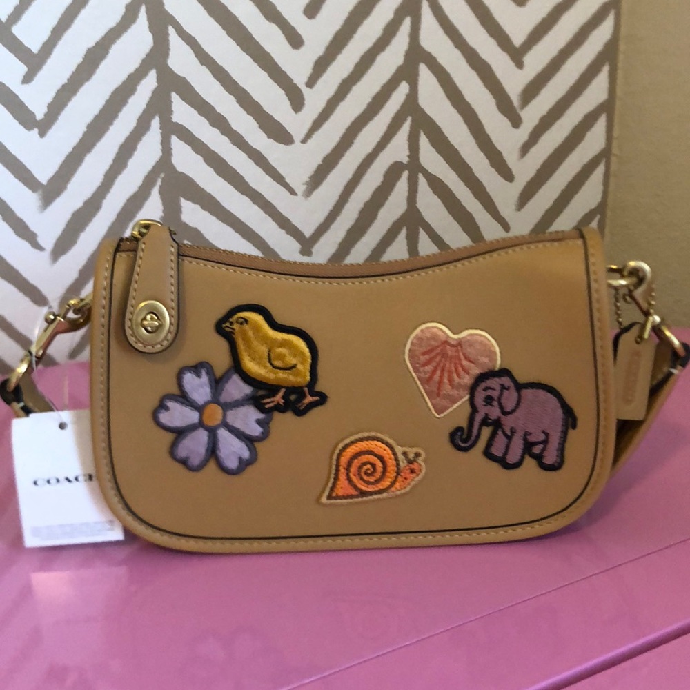 Brand new coach swinger